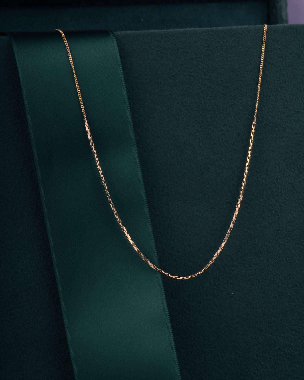 De Lucille Ball ketting 14k