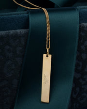 Written in gold hanger