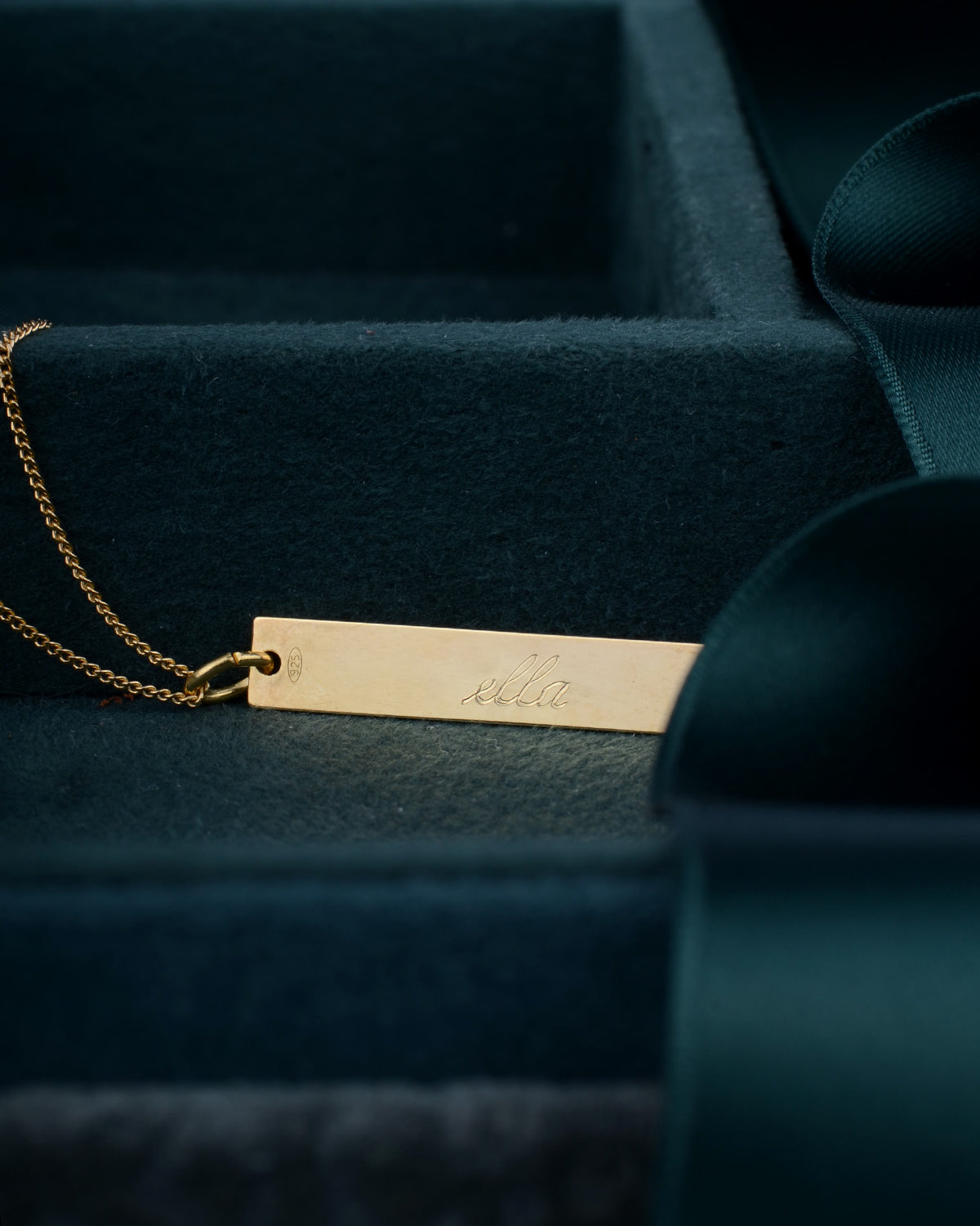 Written in gold hanger