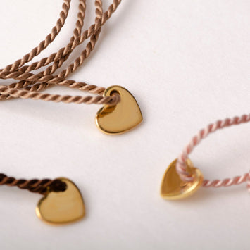 Armband love knot ❤  hart onder de riem