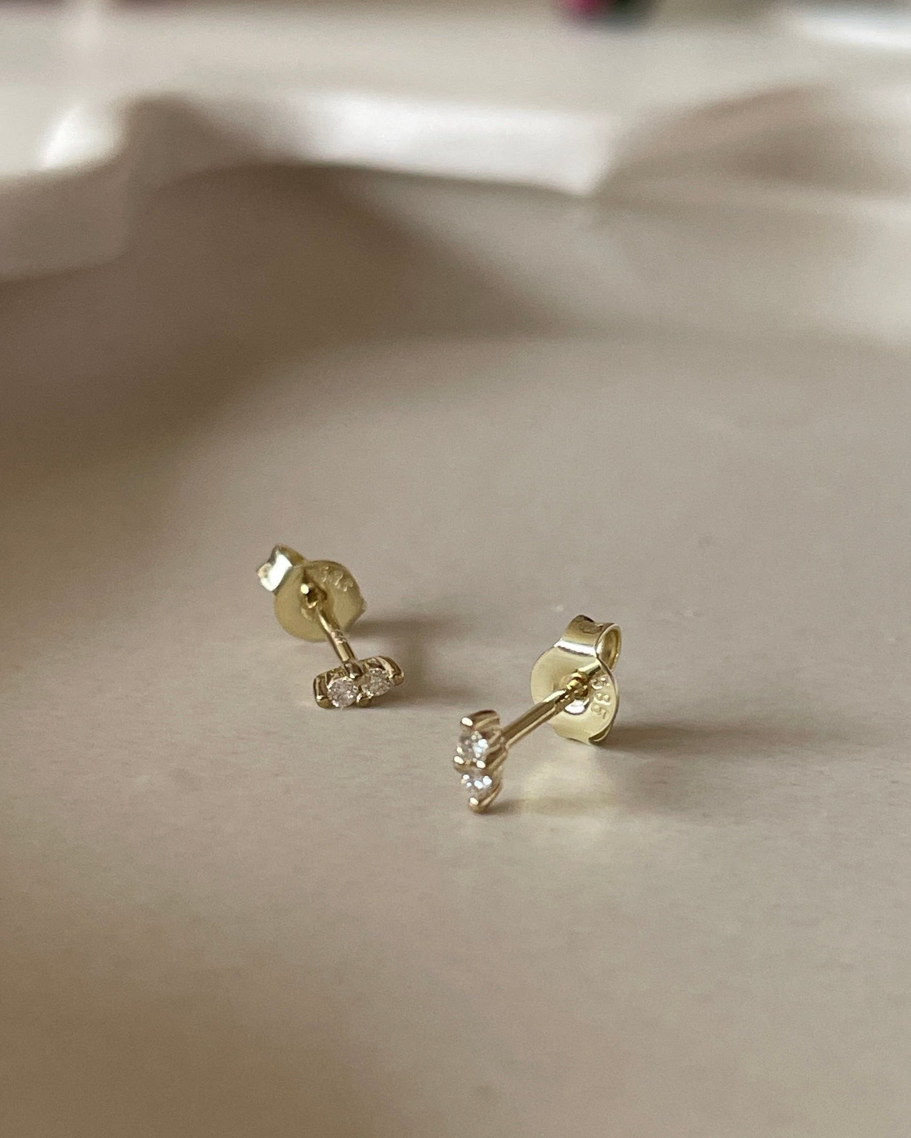 Oorbellen 14k double diamond studs